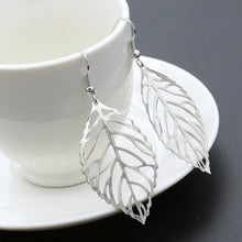 Load image into Gallery viewer, 2020 Pendientes Mujer new fashion temperament wholesale jewelry hollow metal leaf ladies long fashion temperament earrings
